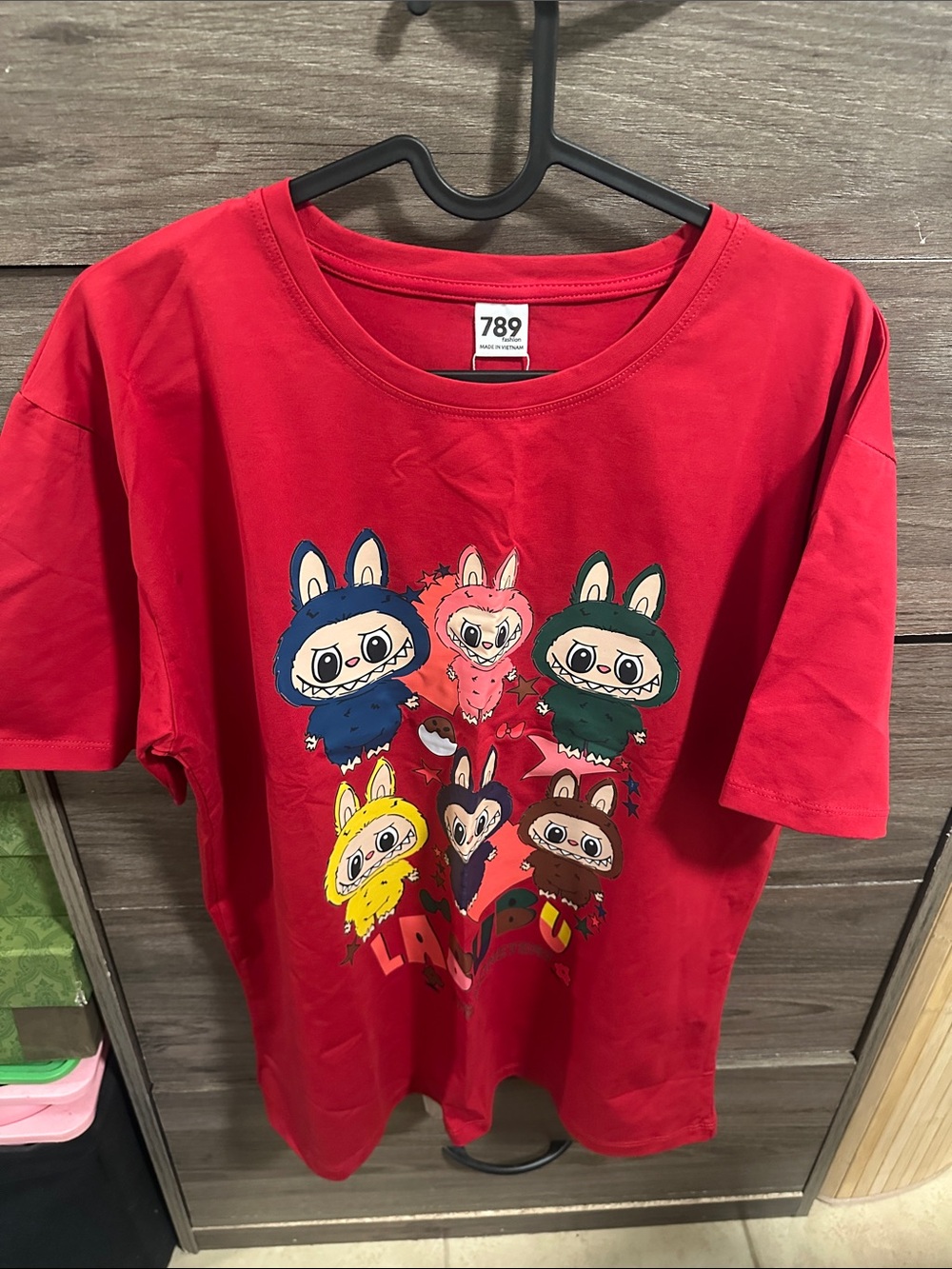 Red Graphic Tee with Colorful Bunny Characters size L